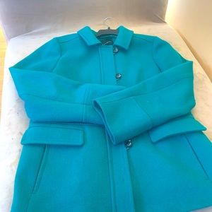 60% wool, 40% Polyester hip pockets, fully lined, medium weight.